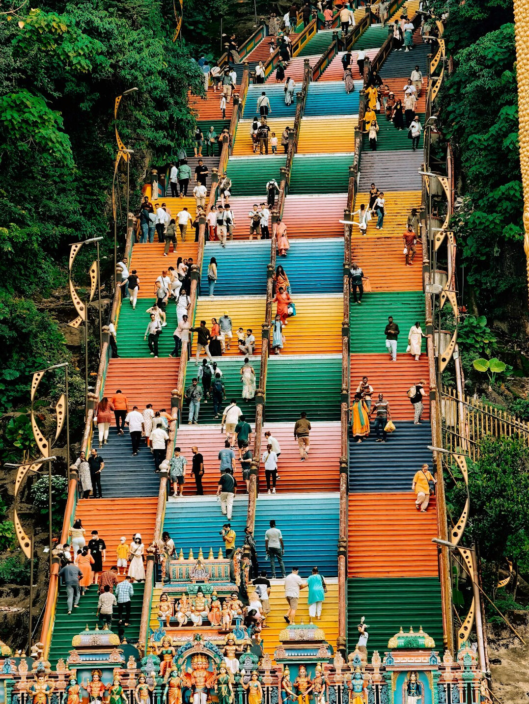 Colorful painted staircase climbing a hill in a Chilean neighborhood